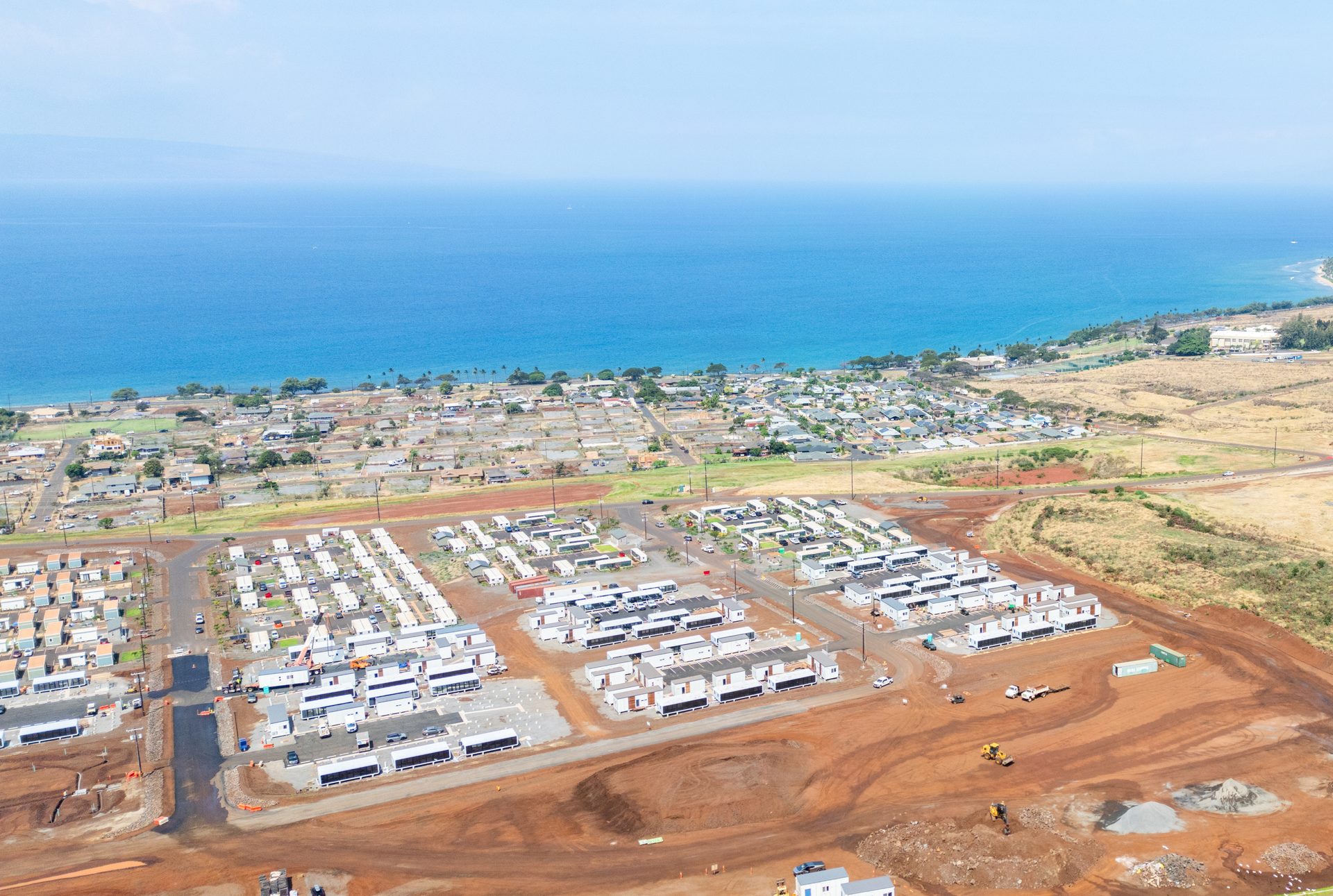 Aerial view of modular housing units at the Lahaina development above the Maui coastline